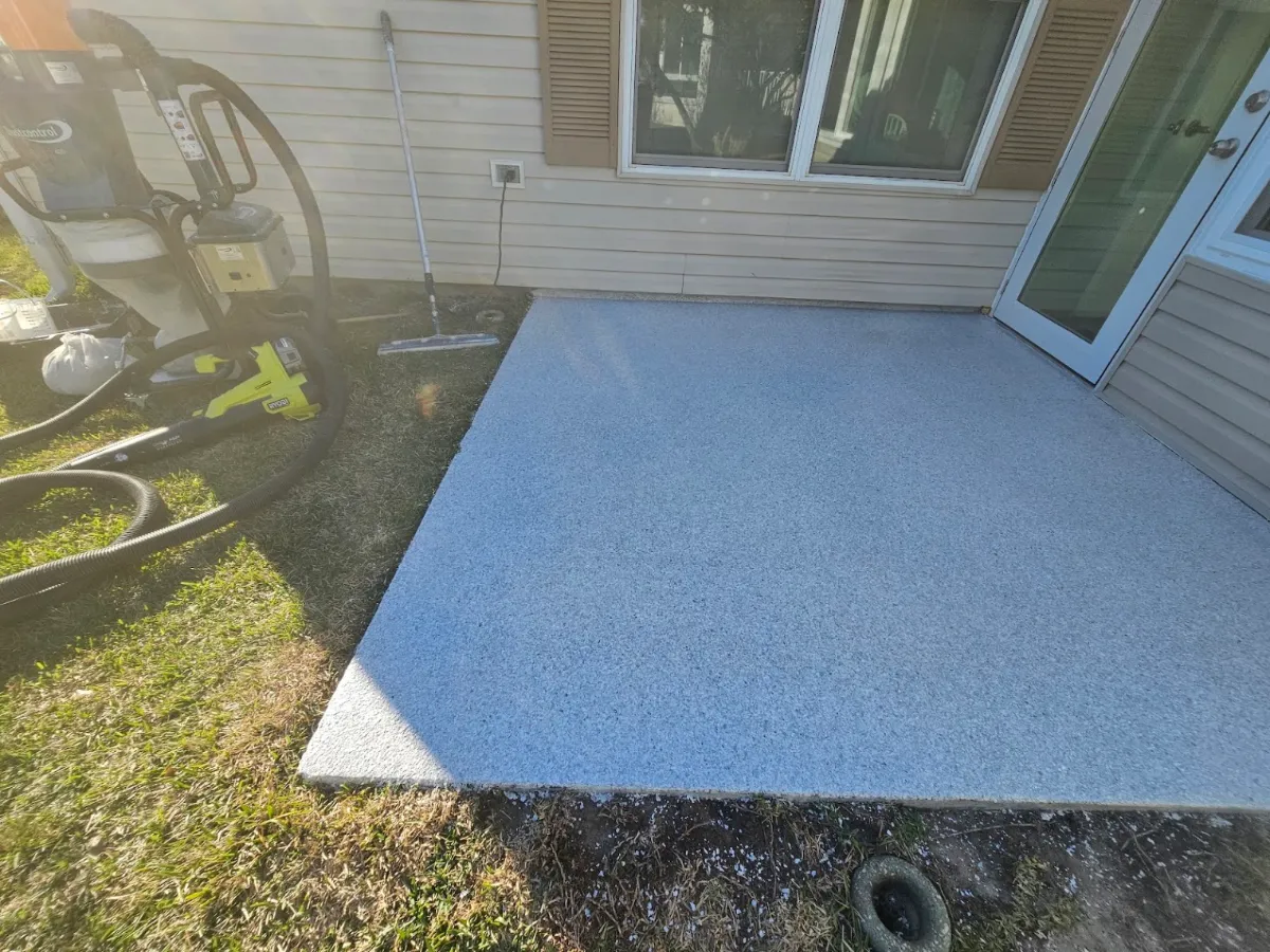 Blue-gray flake epoxy patio coating by Elite Epoxy Surfaces