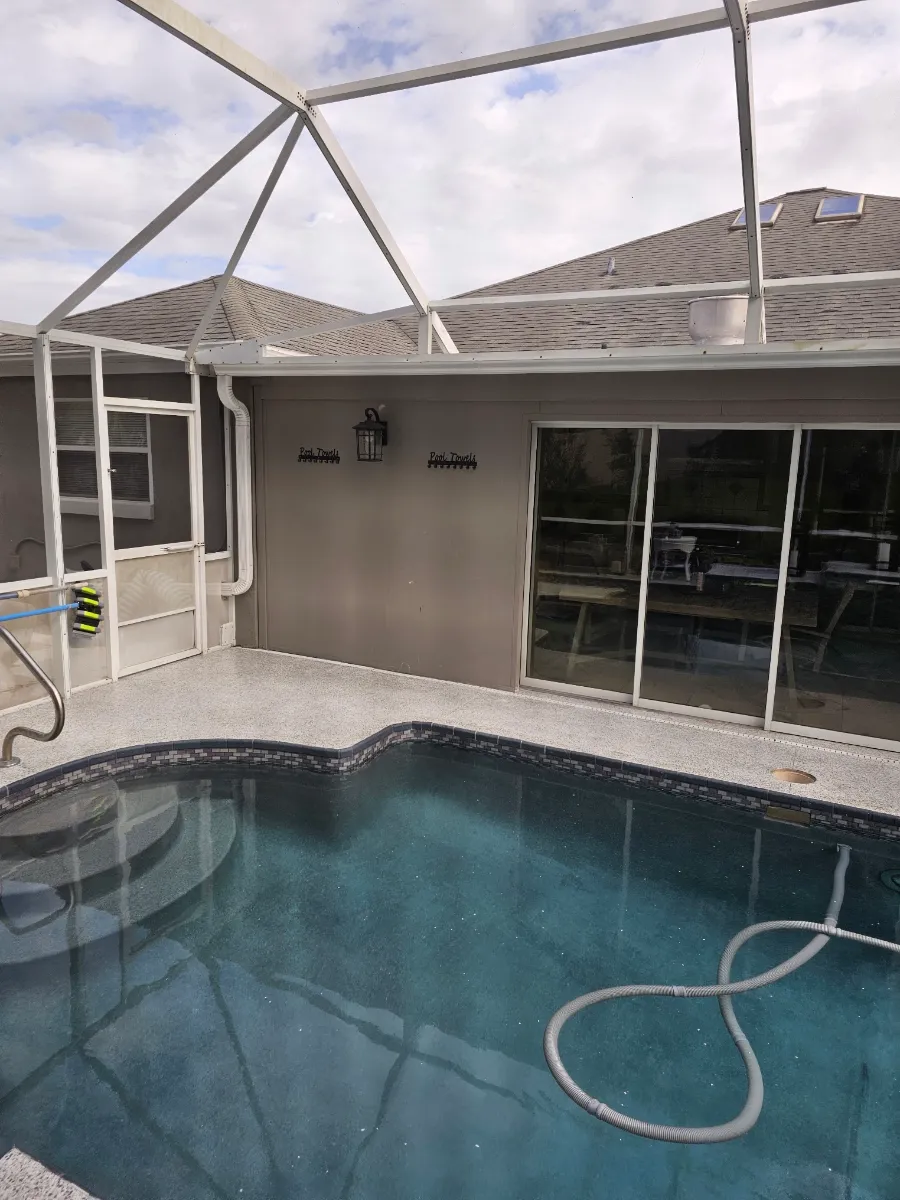 Slip-resistant flake pool deck coating by Elite Epoxy Surfaces