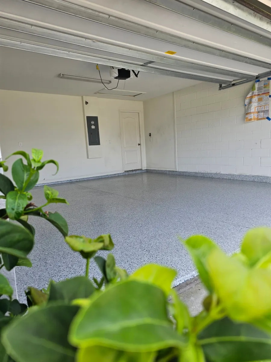 Multi-color flake epoxy garage floor by Elite Epoxy Surfaces