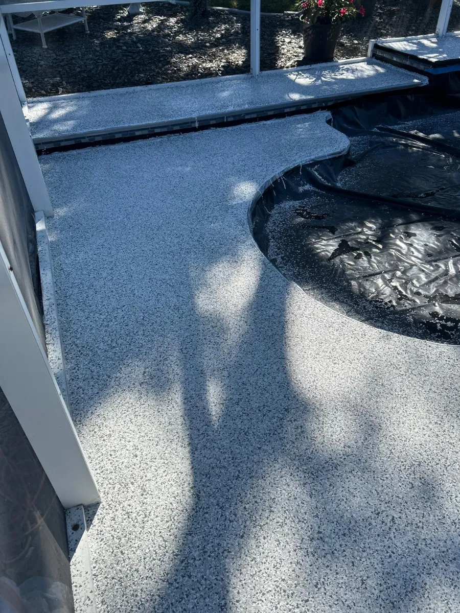 Overhead pool deck coating by Elite Epoxy Surfaces